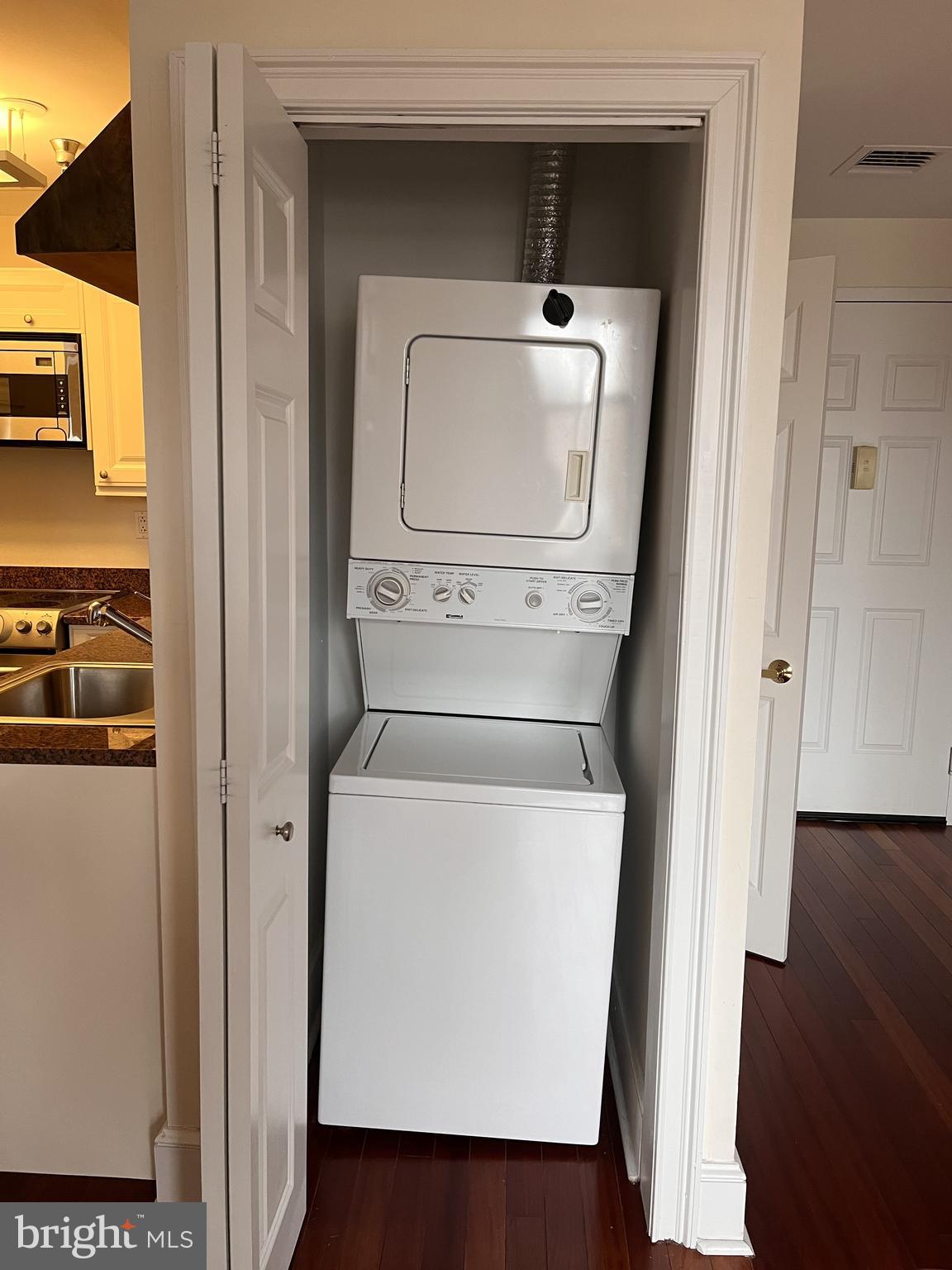 1500 Chestnut Street, Unit 15I Philadelphia, PA 19102 - Photo 11 of 18 a utility room with dryer and washer