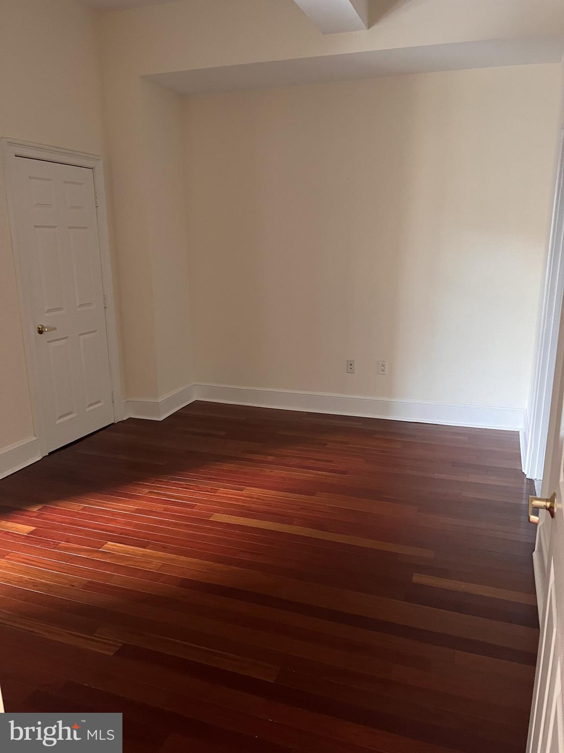 1500 Chestnut Street, Unit 15I Philadelphia, PA 19102 - Photo 7 of 18 a view of room with wooden floor