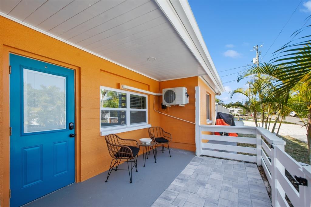 1214 Bay Pine Boulevard Indian Rocks Beach, FL 33785 - Photo 29 of 49 a outdoor space with patio the couches and potted plants