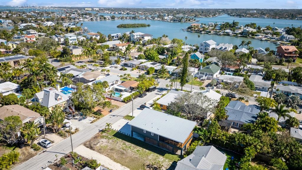1214 Bay Pine Boulevard Indian Rocks Beach, FL 33785 - Photo 43 of 49 an aerial view of a houses with a lake view