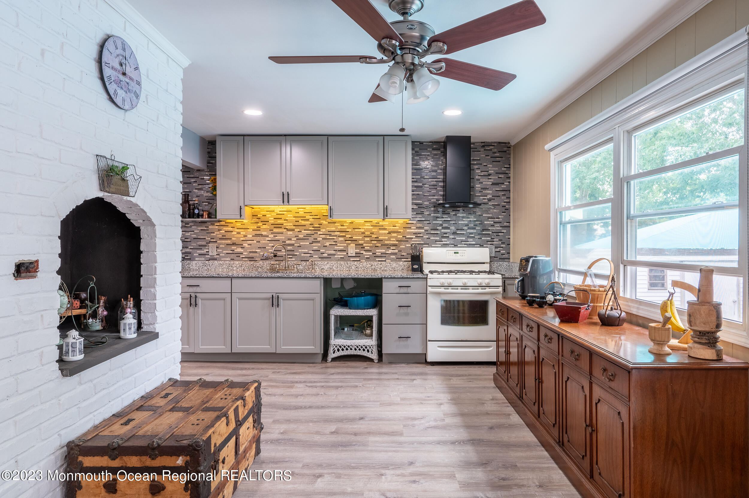30 London Road Brick, NJ 08723 - Photo 23 of 64 a kitchen with stainless steel appliances granite countertop a stove oven and a refrigerator
