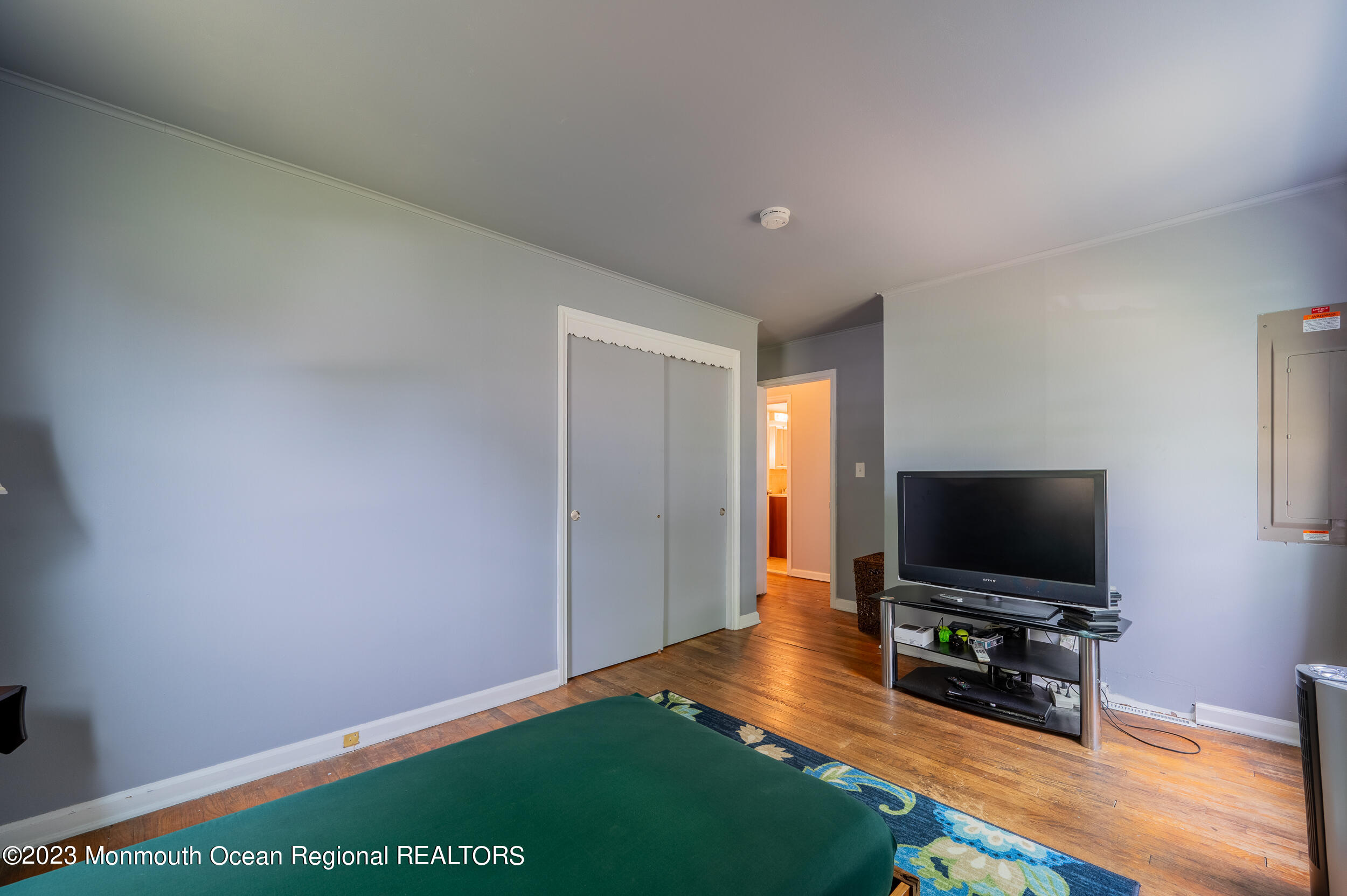 30 London Road Brick, NJ 08723 - Photo 28 of 64 a living room with a flat screen tv and a window