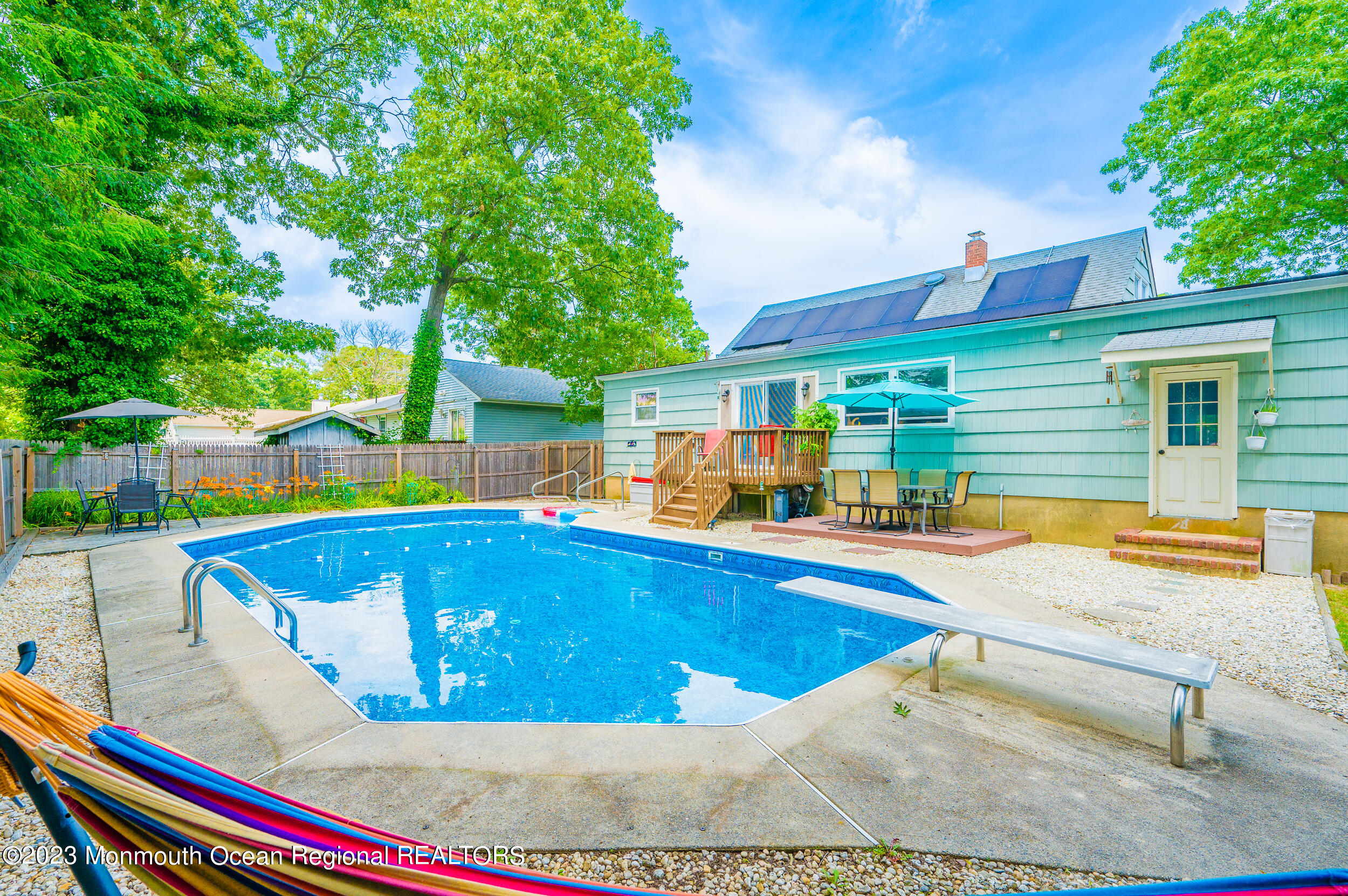 30 London Road Brick, NJ 08723 - Photo 42 of 64 a view of swimming pool with chairs