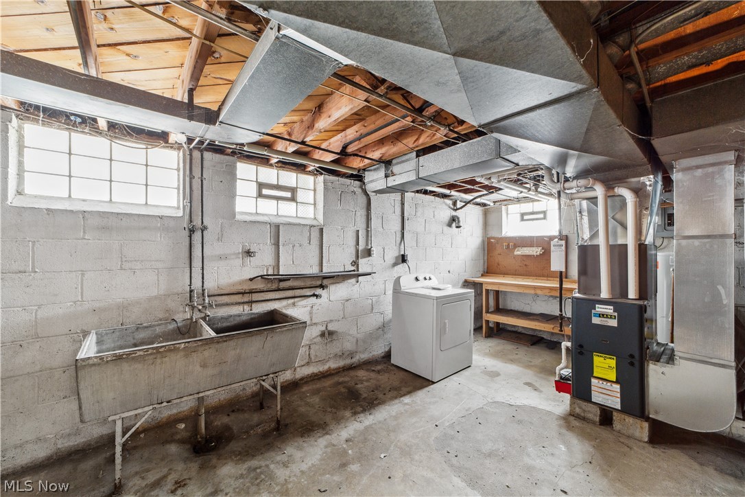 1655 Lyndhurst Road Cleveland, OH 44124 - Photo 24 of 30 Basement featuring washer / dryer, heating utilities, and sink