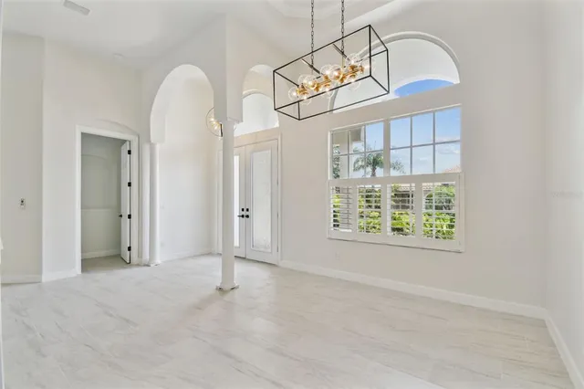 a bathroom with a bathtub a sink and a mirror
