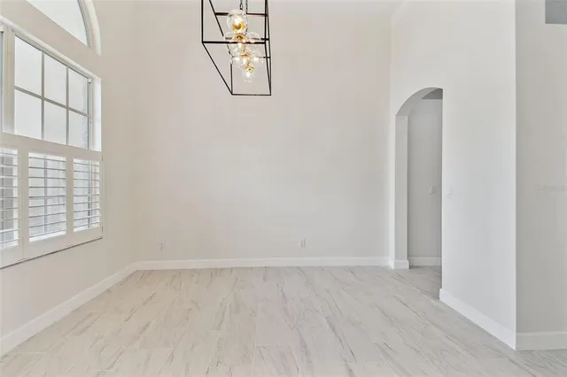 a view of a room that has a window in it