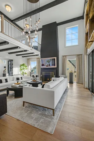 a view of a house with swimming pool and sitting area