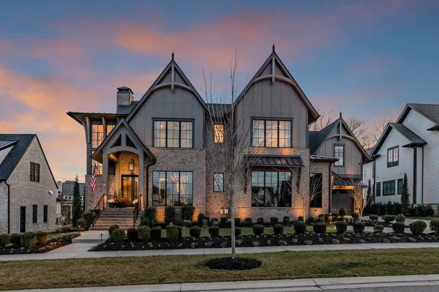 a spacious bathroom with a granite countertop sink and a mirror