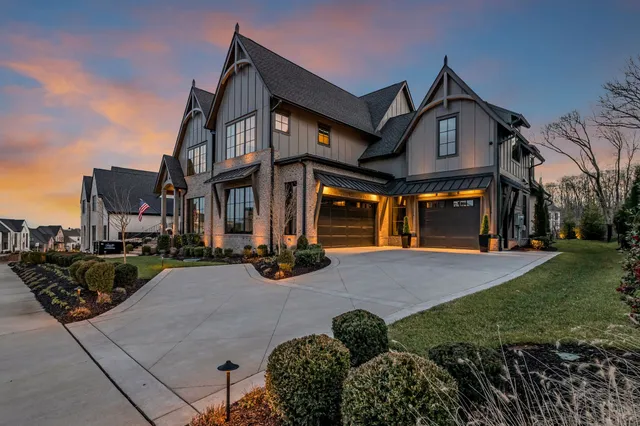 a view of a livingroom with furniture and hardwood floor