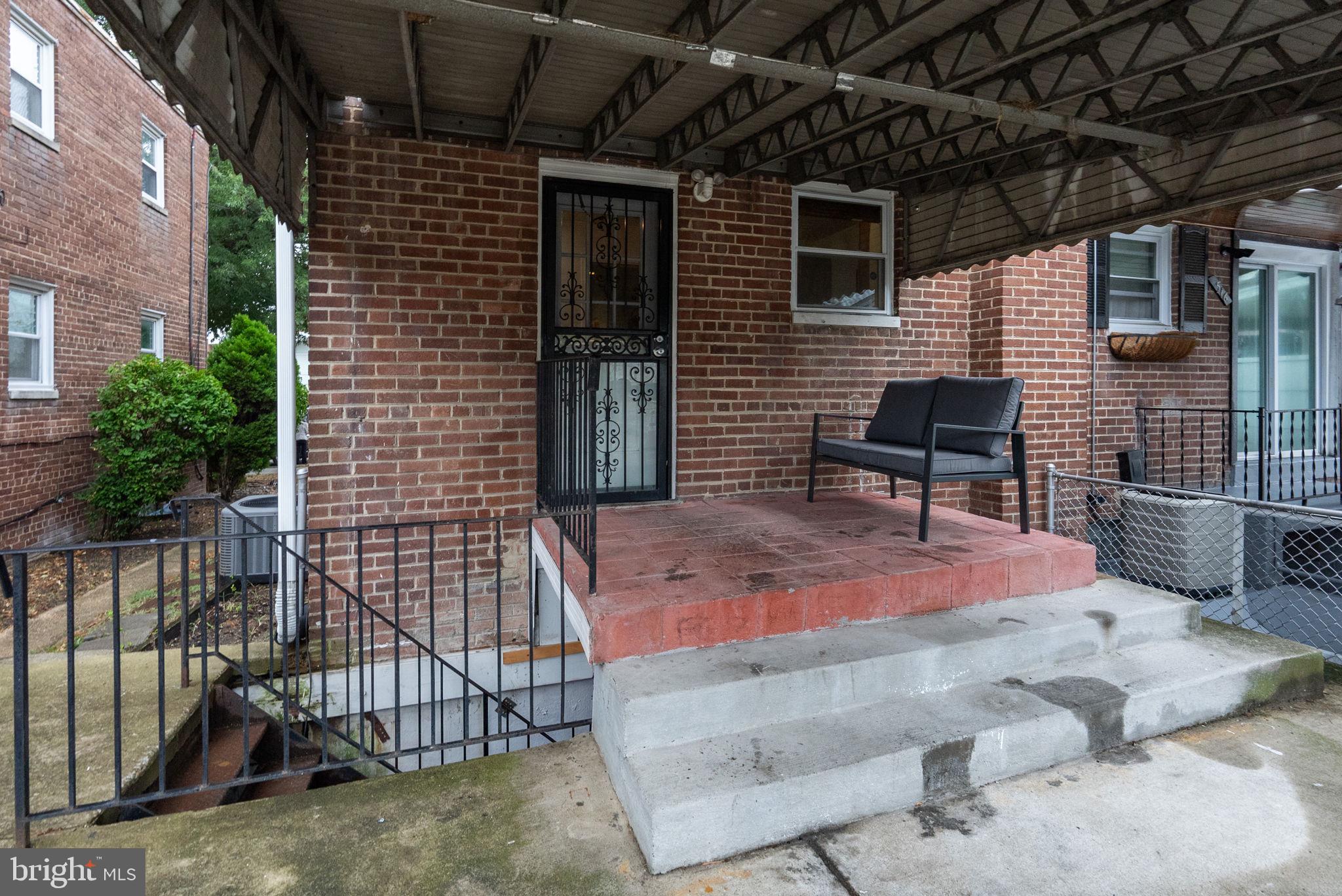 518 Riggs Road Northeast Washington, DC 20011 - Photo 14 of 18 a backyard with table and chairs