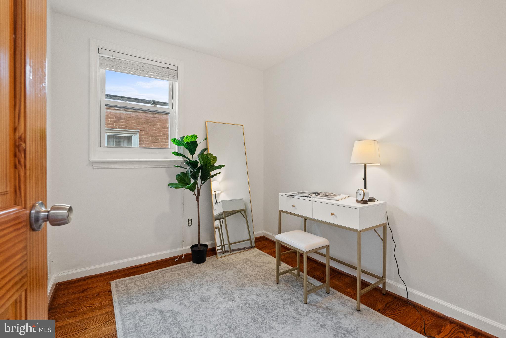 518 Riggs Road Northeast Washington, DC 20011 - Photo 10 of 18 a view of a room with a table and workspace
