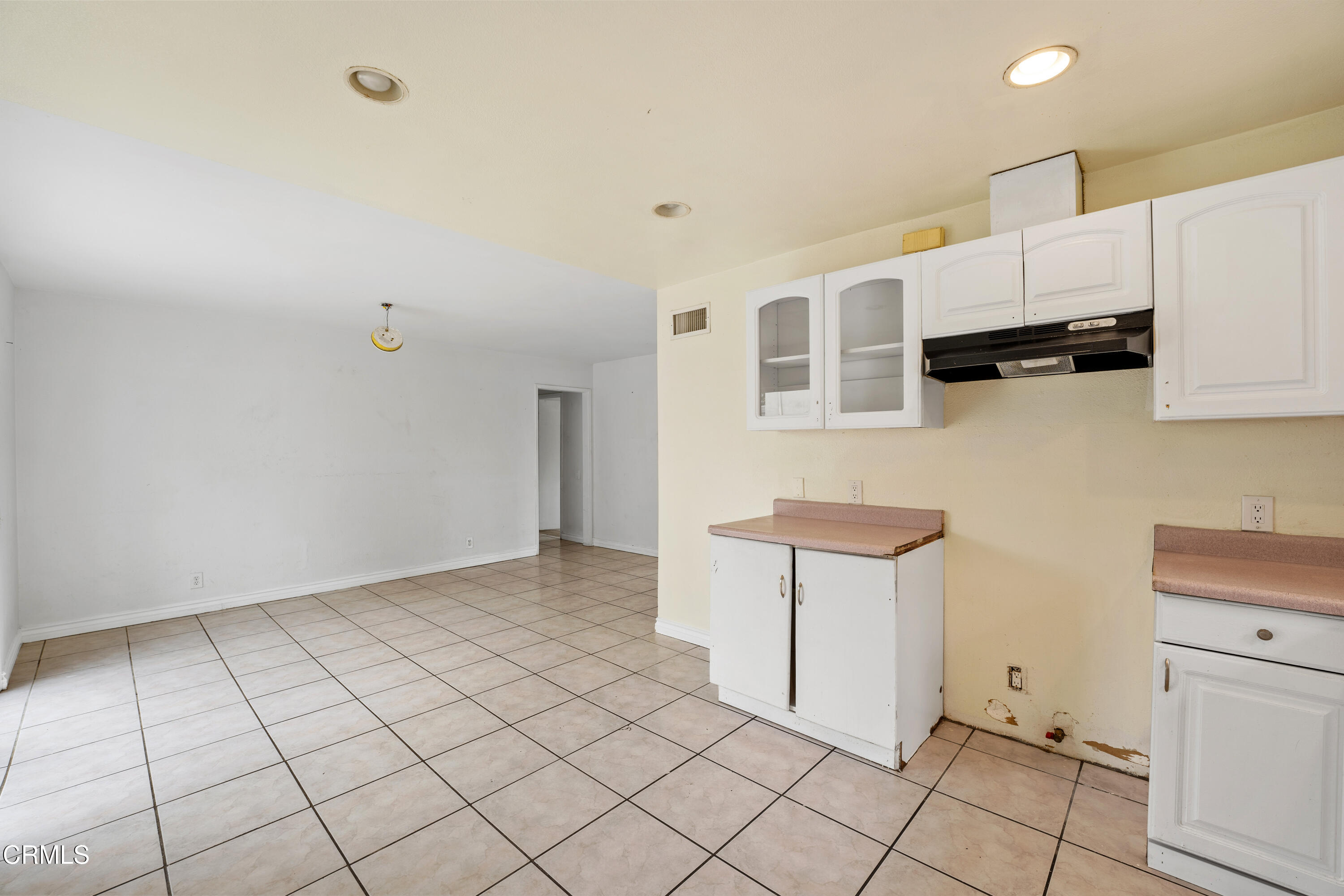 918 Ann Arbor Avenue Ventura, CA 93004 - Photo 15 of 25 a view of kitchen with cabinets and white appliances