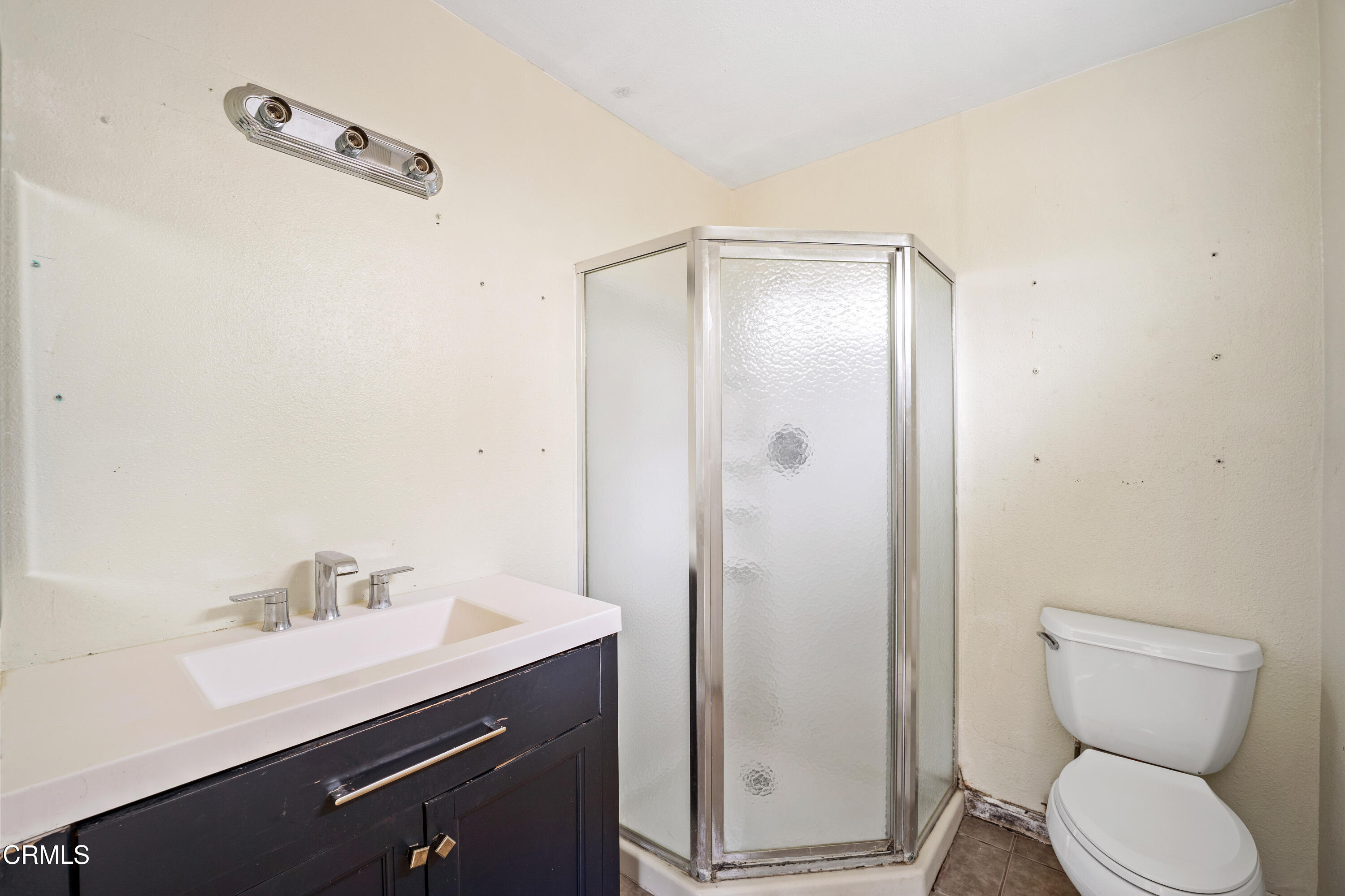 918 Ann Arbor Avenue Ventura, CA 93004 - Photo 20 of 25 a bathroom with a sink a toilet and shower