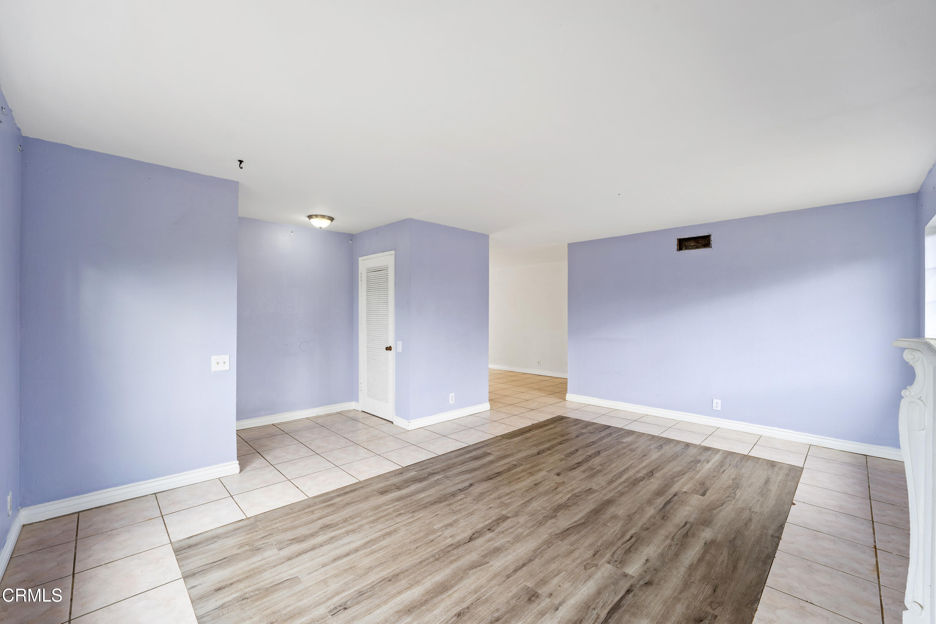 918 Ann Arbor Avenue Ventura, CA 93004 - Photo 7 of 25 a view of an empty room with wooden floor