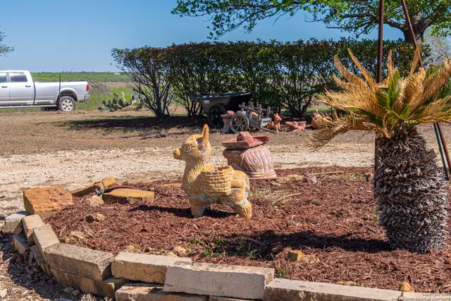 a floor to ceiling window and outdoor seating