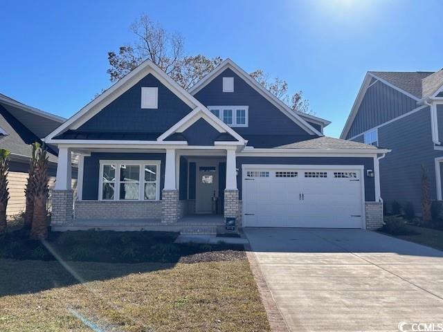9017 Aria Way Longs, SC 29568 - Photo 1 of 1 Craftsman-style home featuring covered porch and a
