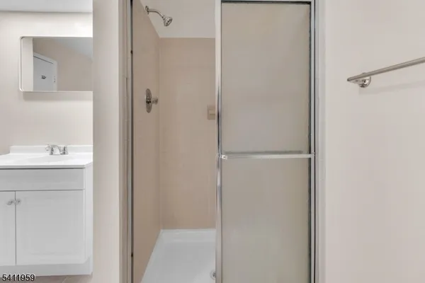 a bathroom with a sink a toilet and a bathtub
