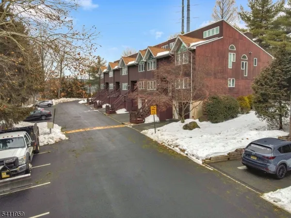 a view of a street with a house