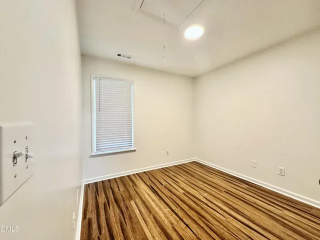 a view of a yard in front of a house