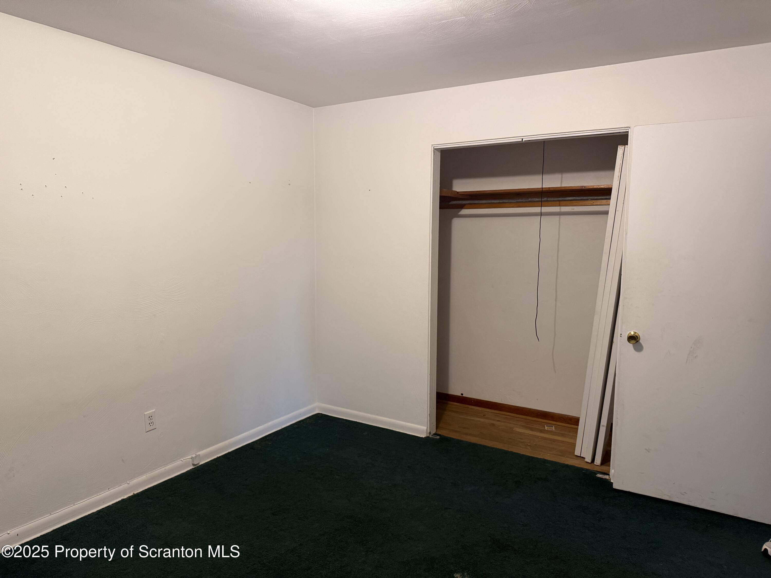 612 Oak Street Old Forge, PA 18518 - Photo 14 of 17 a view of small space with a door