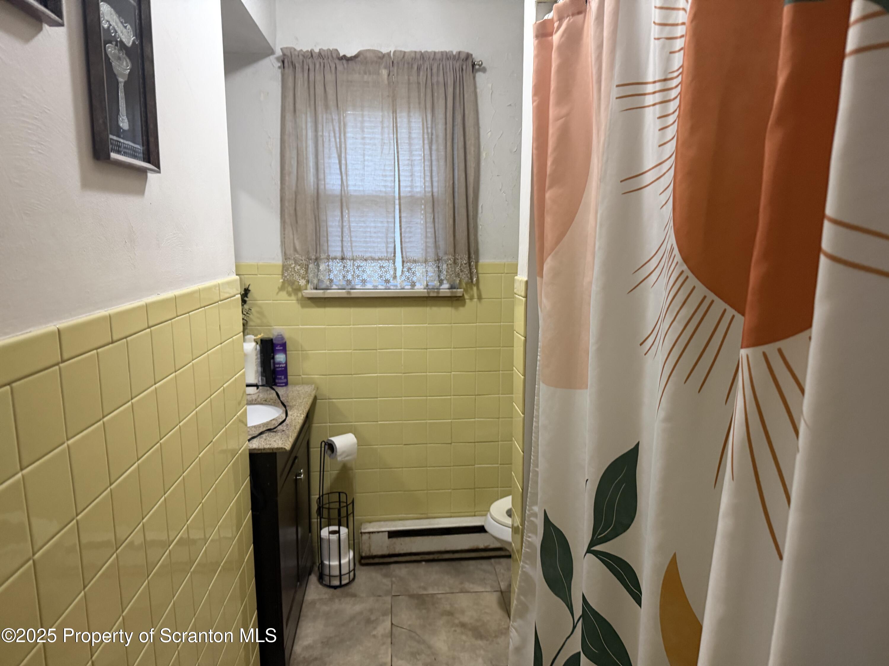 612 Oak Street Old Forge, PA 18518 - Photo 10 of 17 a bathroom with a sink
