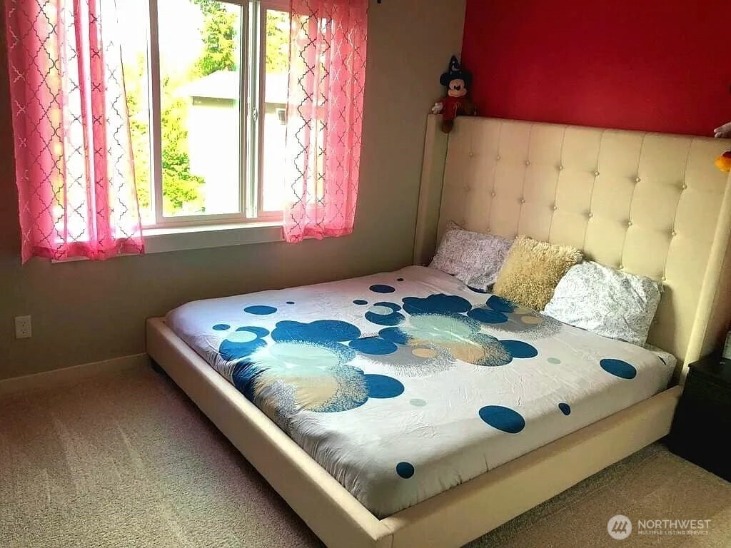 22823 23rd Avenue Southeast, Unit 8 Bothell, WA 98021 - Photo 11 of 17 a bathroom with a tub sink and mirror
