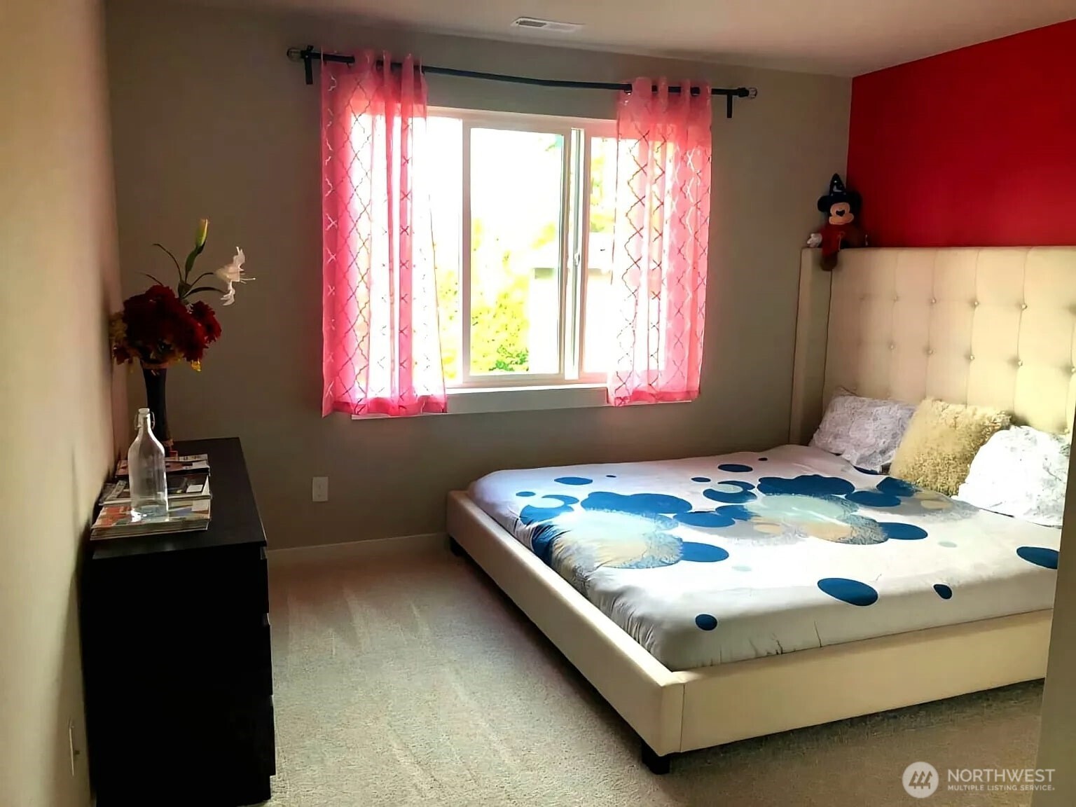 22823 23rd Avenue Southeast, Unit 8 Bothell, WA 98021 - Photo 12 of 17 a bedroom with a bed and a window