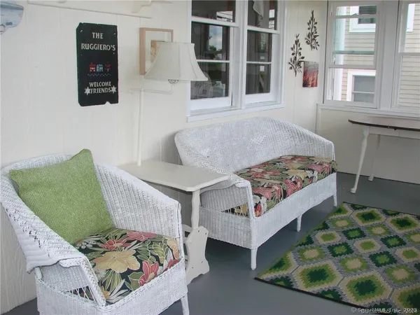 a living room with a couch and a table