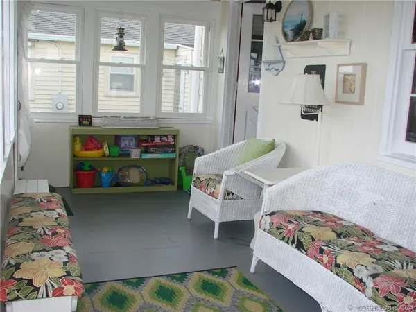 a bedroom with bed and window
