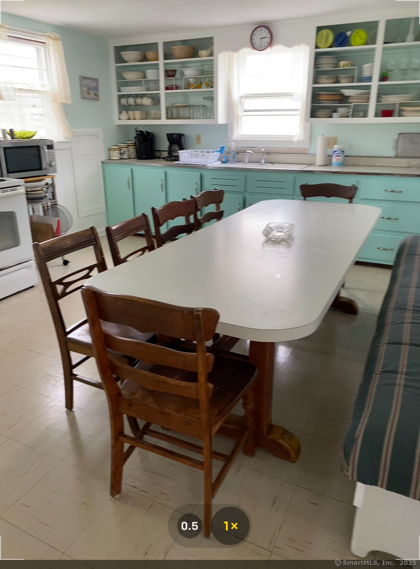 405 Seaside Avenue Westbrook, CT 06498 - Photo 8 of 17 Spacious kitchen with large table for dining or card or board games.