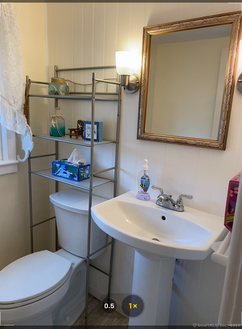 405 Seaside Avenue Westbrook, CT 06498 - Photo 9 of 17 Recently remodeled half bath on upper level
