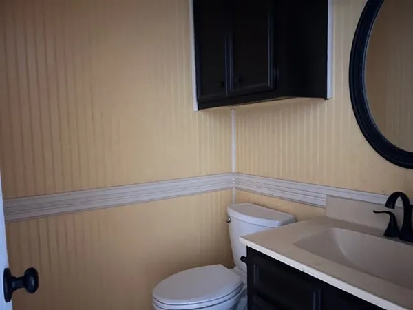 a view of a sink and a window in a room