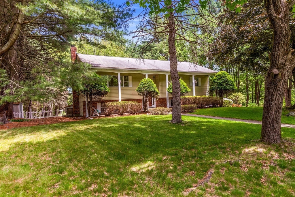 15 Conestoga Road Lexington, MA 02421 - Photo 31 of 31 a view of a house with a yard porch and sitting area