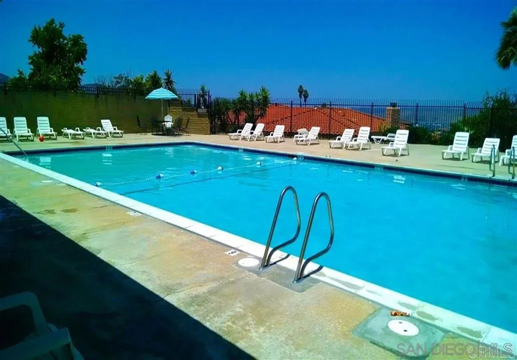 2220 Valley Mill Road El Cajon, CA 92020 - Photo 31 of 34 a view of a swimming pool with an outdoor seating and yard