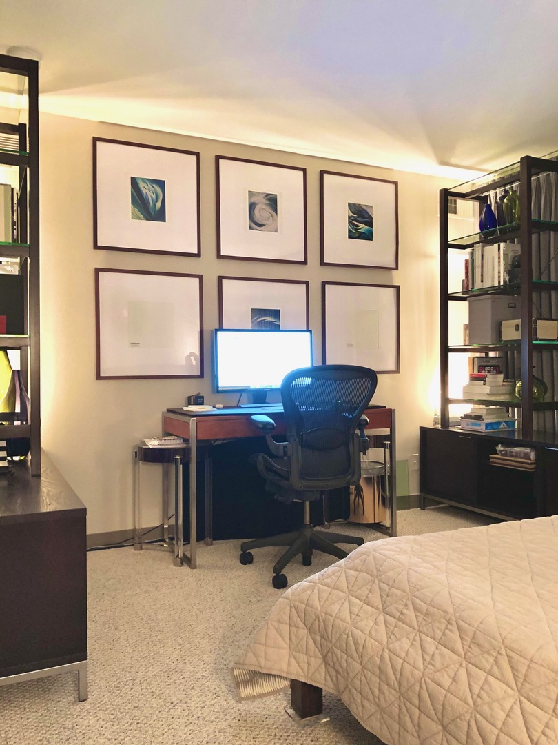 3275 Kirchoff Road, Unit 231 Rolling Meadows, IL 60008 - Photo 6 of 6 a bedroom with a bed and a desk