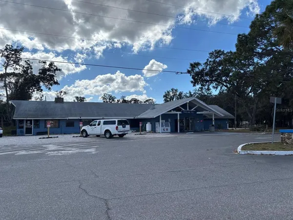a view of a building with a road