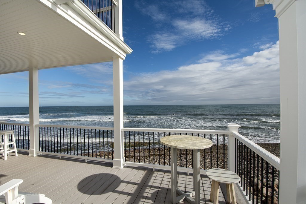 61 Seaside Road Scituate, MA 02066 - Photo 11 of 39 a balcony with a stove