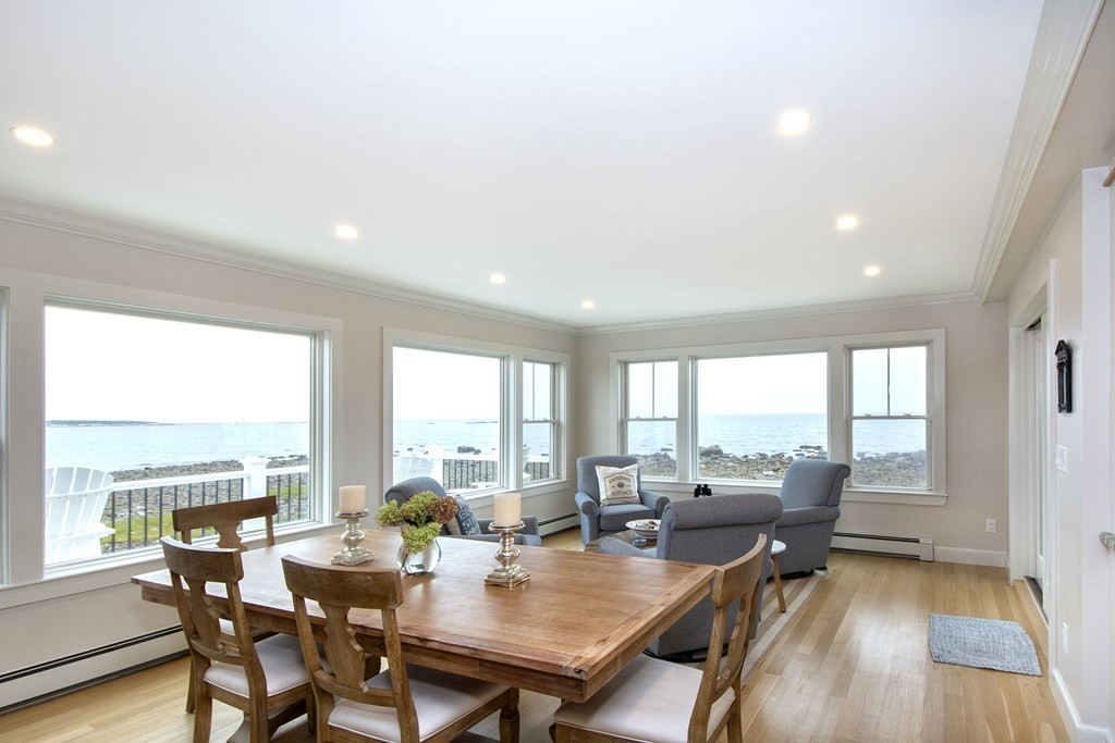 61 Seaside Road Scituate, MA 02066 - Photo 18 of 39 a view of a dining room with furniture window and wooden floor