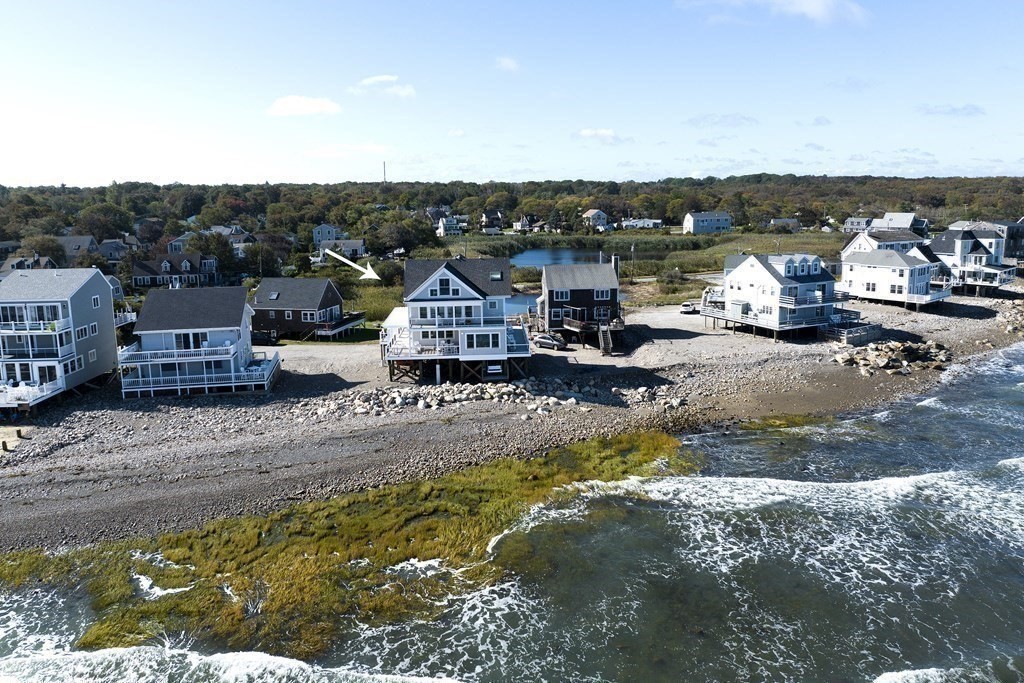 61 Seaside Road Scituate, MA 02066 - Photo 2 of 39 a view of a lake with houses