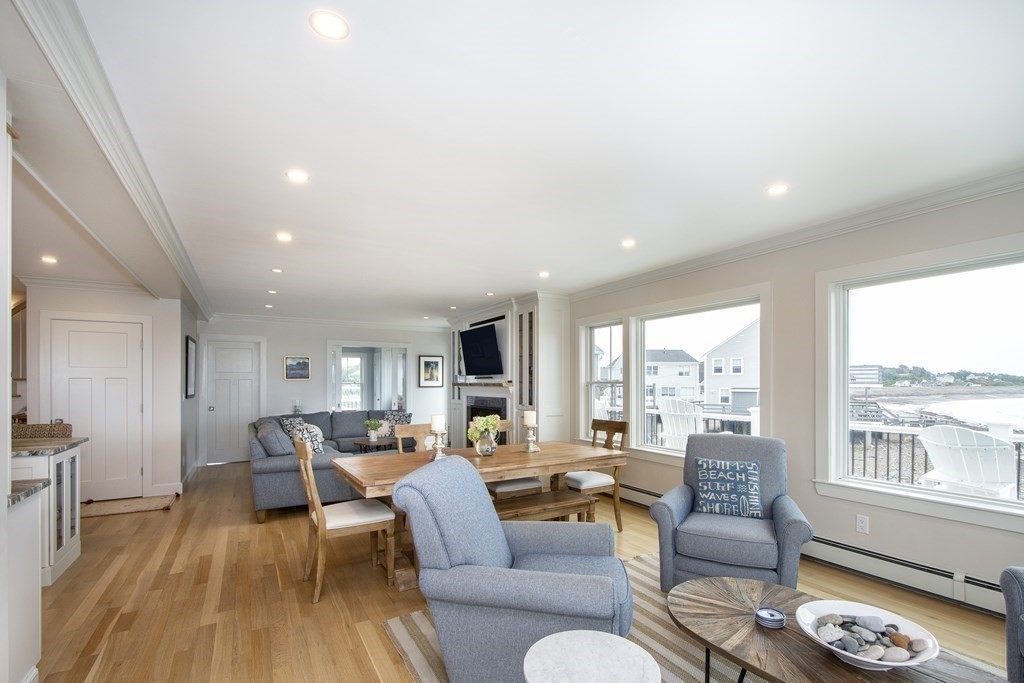 61 Seaside Road Scituate, MA 02066 - Photo 21 of 39 a living room with furniture and a large window