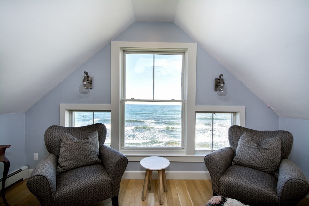61 Seaside Road Scituate, MA 02066 - Photo 36 of 39 a living room with furniture and a large window