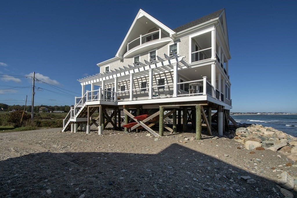 61 Seaside Road Scituate, MA 02066 - Photo 6 of 39 a view of a house with backyard porch and sitting area