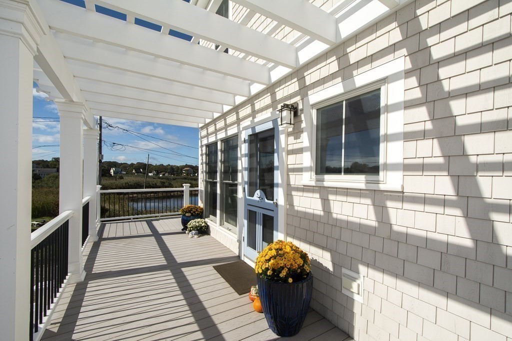 61 Seaside Road Scituate, MA 02066 - Photo 7 of 39 a black and white photo of a building