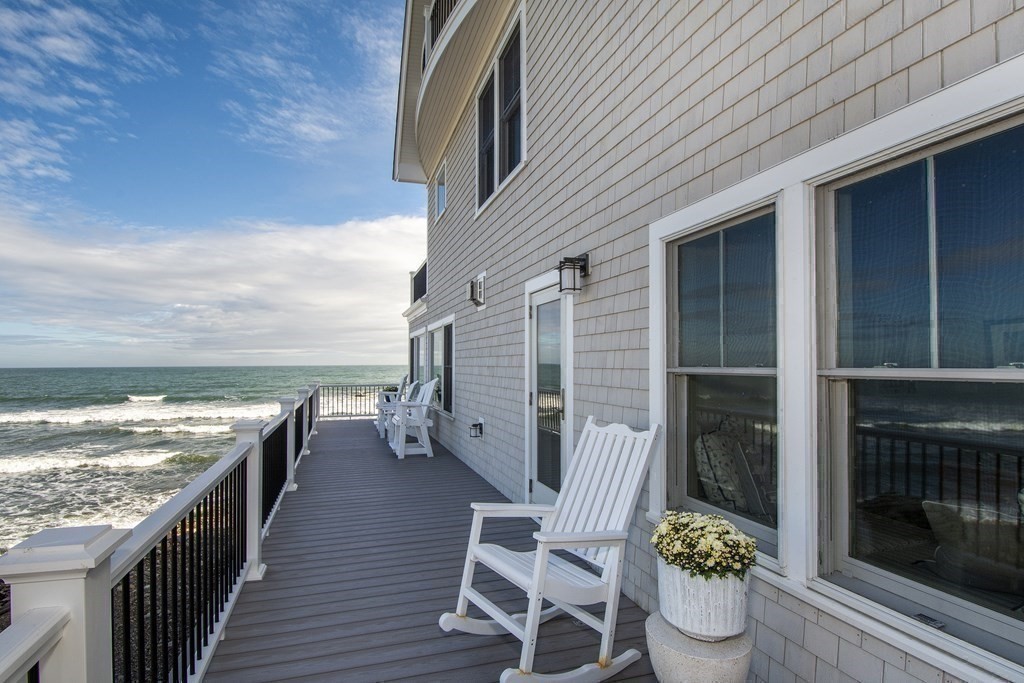 61 Seaside Road Scituate, MA 02066 - Photo 10 of 39 a view of a balcony with chairs