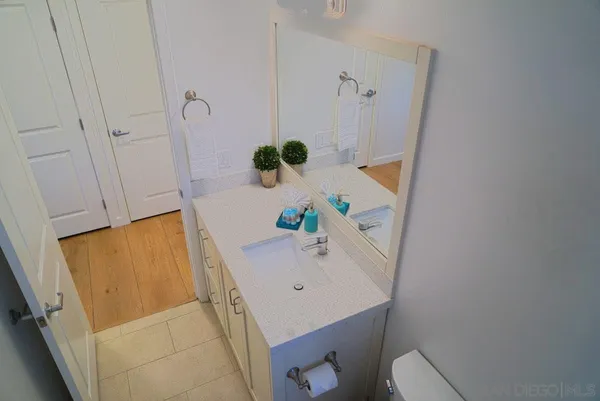 a bathroom with a sink and toilet