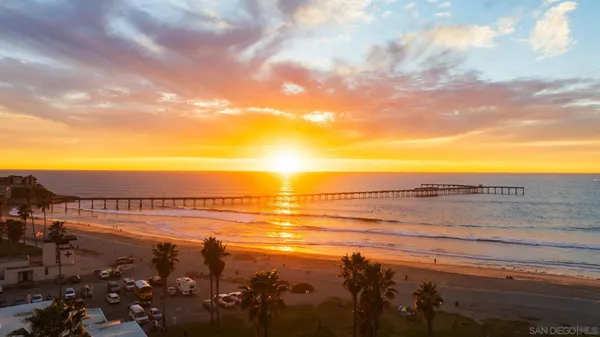a view of a building with a yard