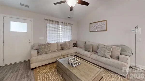 a living room with furniture and a couch