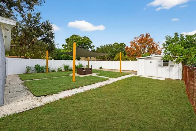 a view of a house with a big yard