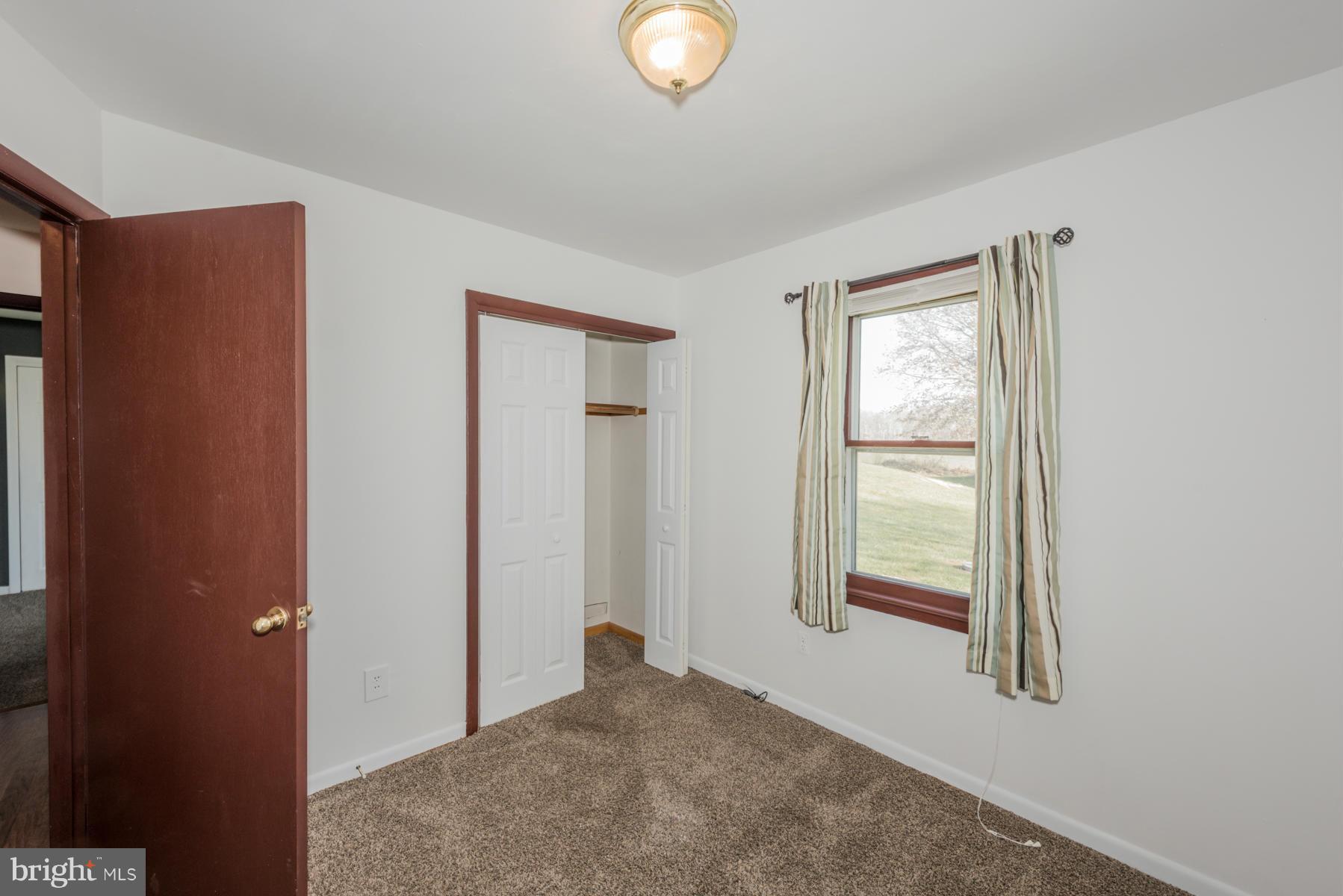 3569 Fringer Road Taneytown, MD 21787 - Photo 14 of 24 a view of livingroom with furniture and windows