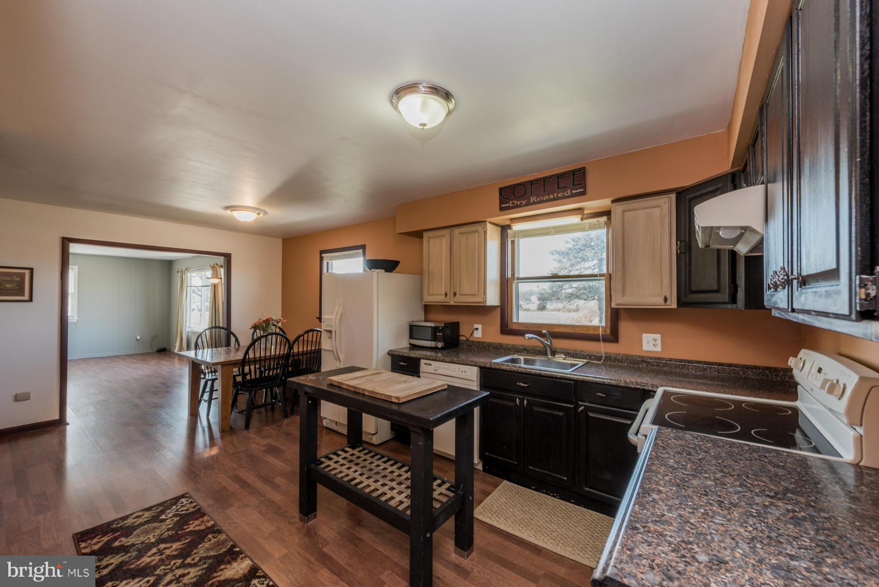 3569 Fringer Road Taneytown, MD 21787 - Photo 8 of 24 a kitchen with granite countertop lots of counter top space and furniture